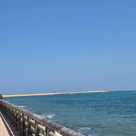 Casa Con Piscina Comunitaria Hébergement de vacances *