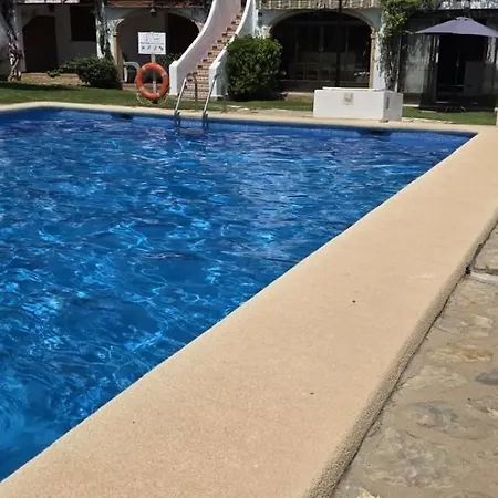 Casa Con Piscina Comunitaria Hébergement de vacances Dénia