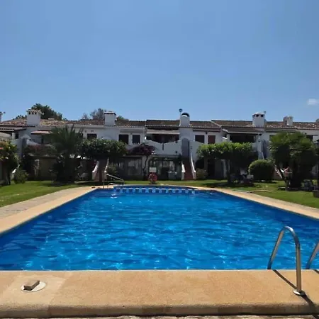 Casa Con Piscina Comunitaria Holiday home